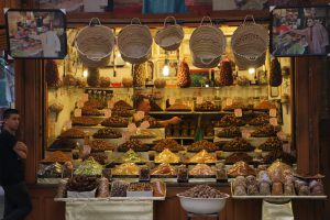 A Moroccan medina is a city’s old district, usually walled and a top attraction in almost every town. Medinas are the hearts and souls of cities. Shopkeepers sell all kinds of goods and services, including a wide assortment of dates, a mainstay of the Moroccan diet